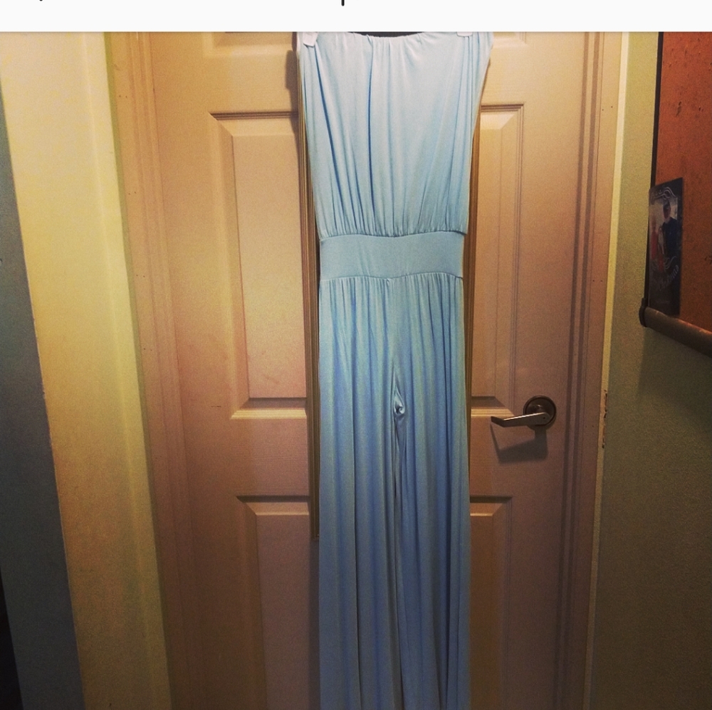 Long romper never used still has taga